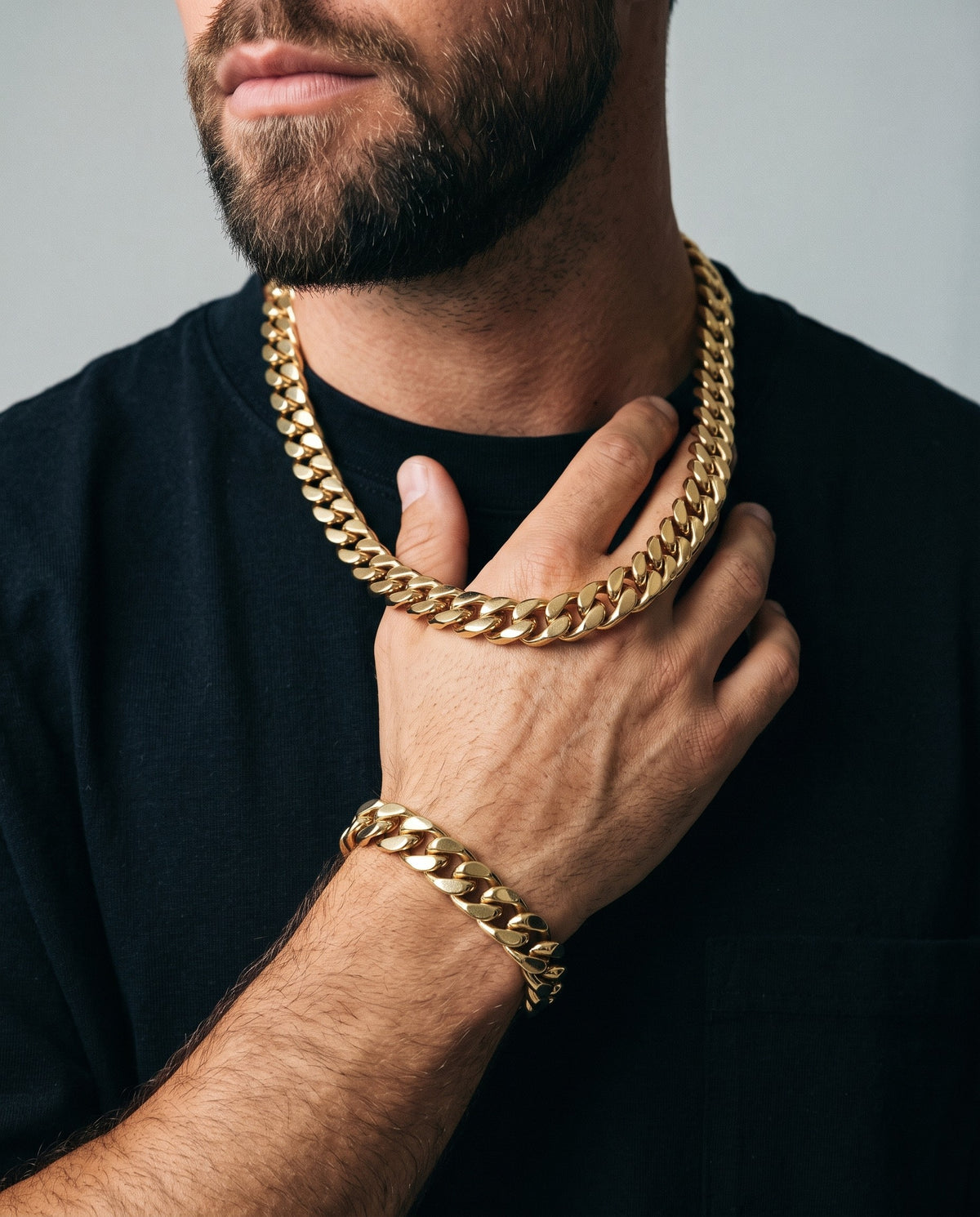 11mm gold Clean Boxed Cubana chain and bracelet worn together
