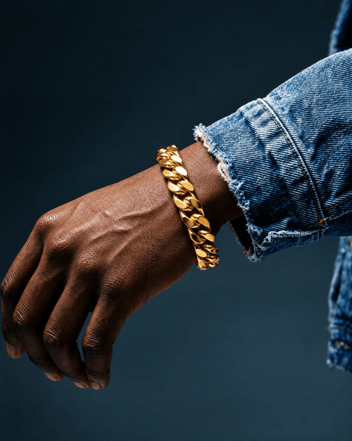 11mm gold Clean Boxed Cubana bracelet worn on the wrist