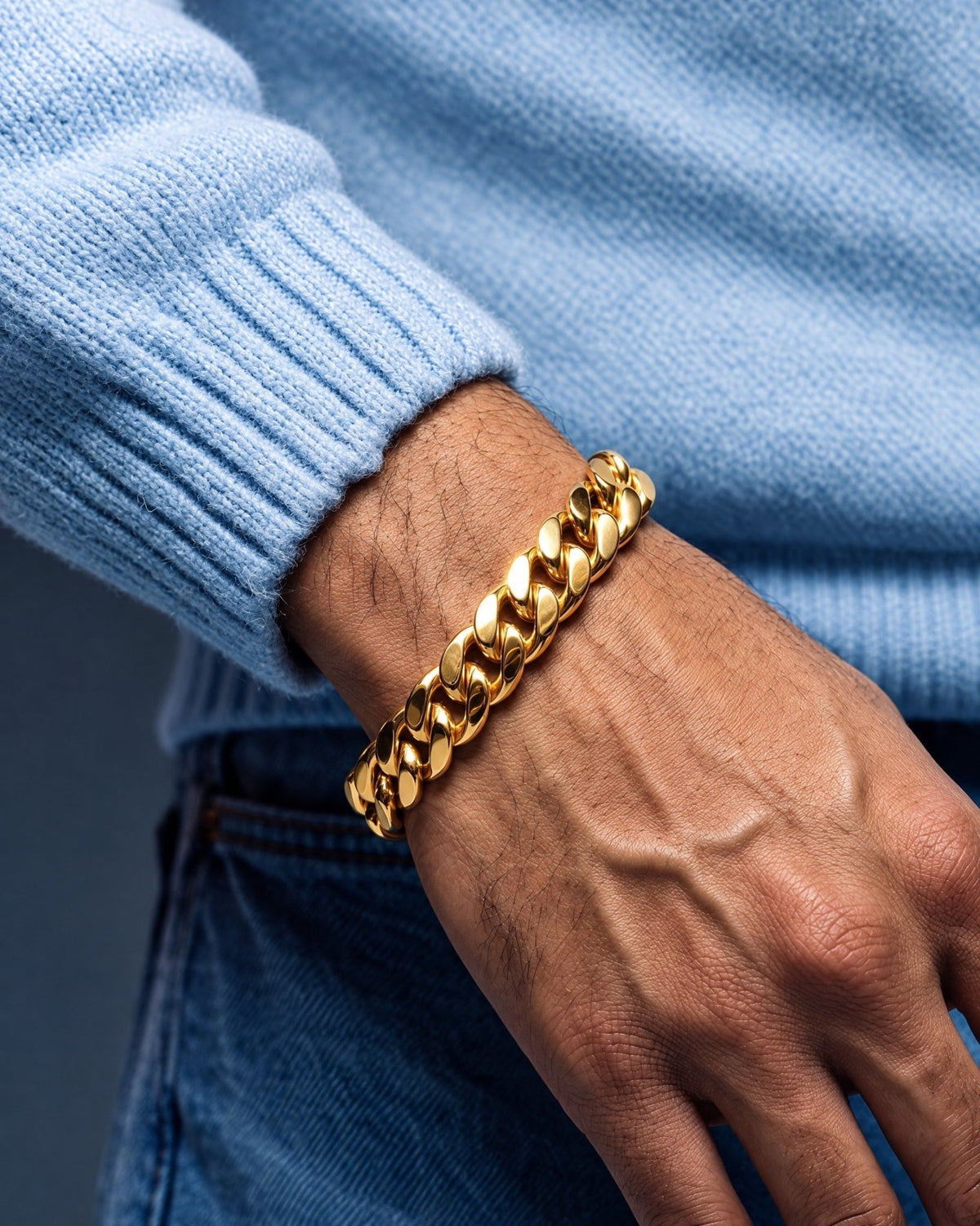 11mm gold Clean Boxed Cubana bracelet worn on the wrist