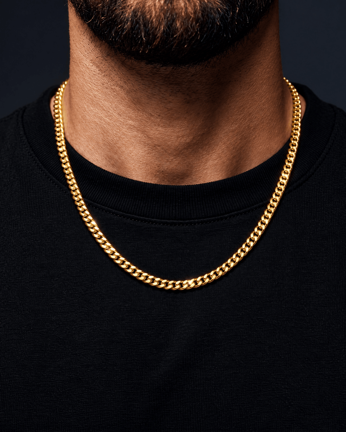 4mm gold Clean Cubana chain worn on the neck