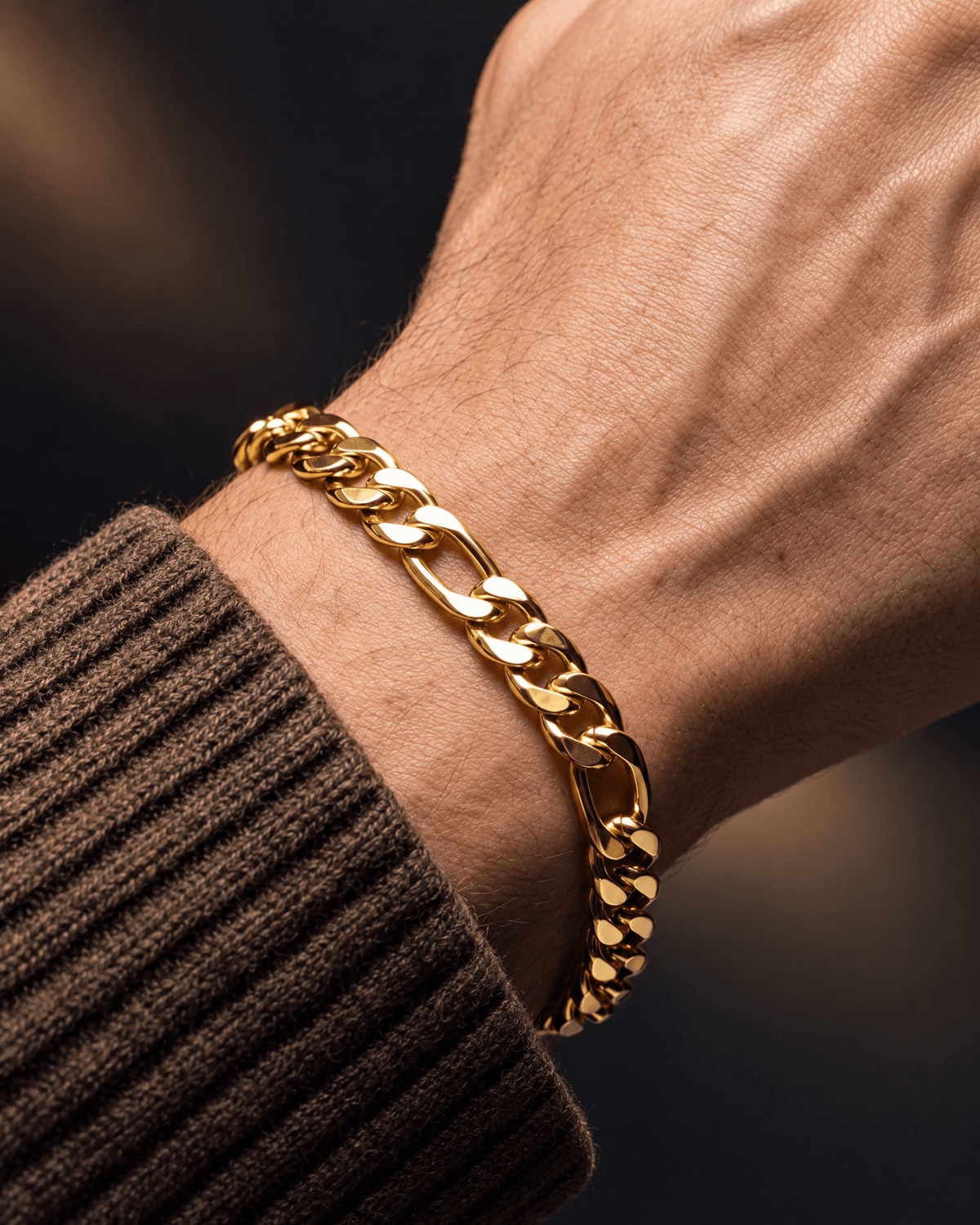 5mm gold Clean Figaro bracelet worn on the wrist