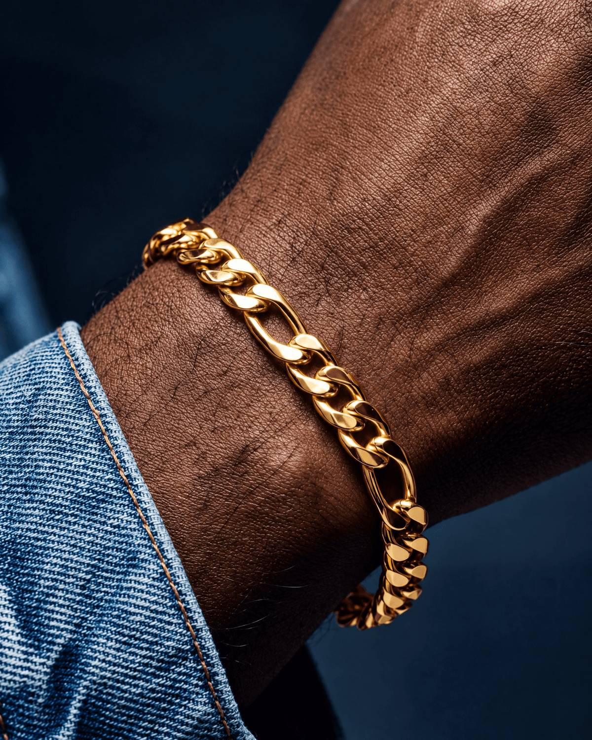 5mm gold Clean Figaro bracelet worn on the wrist