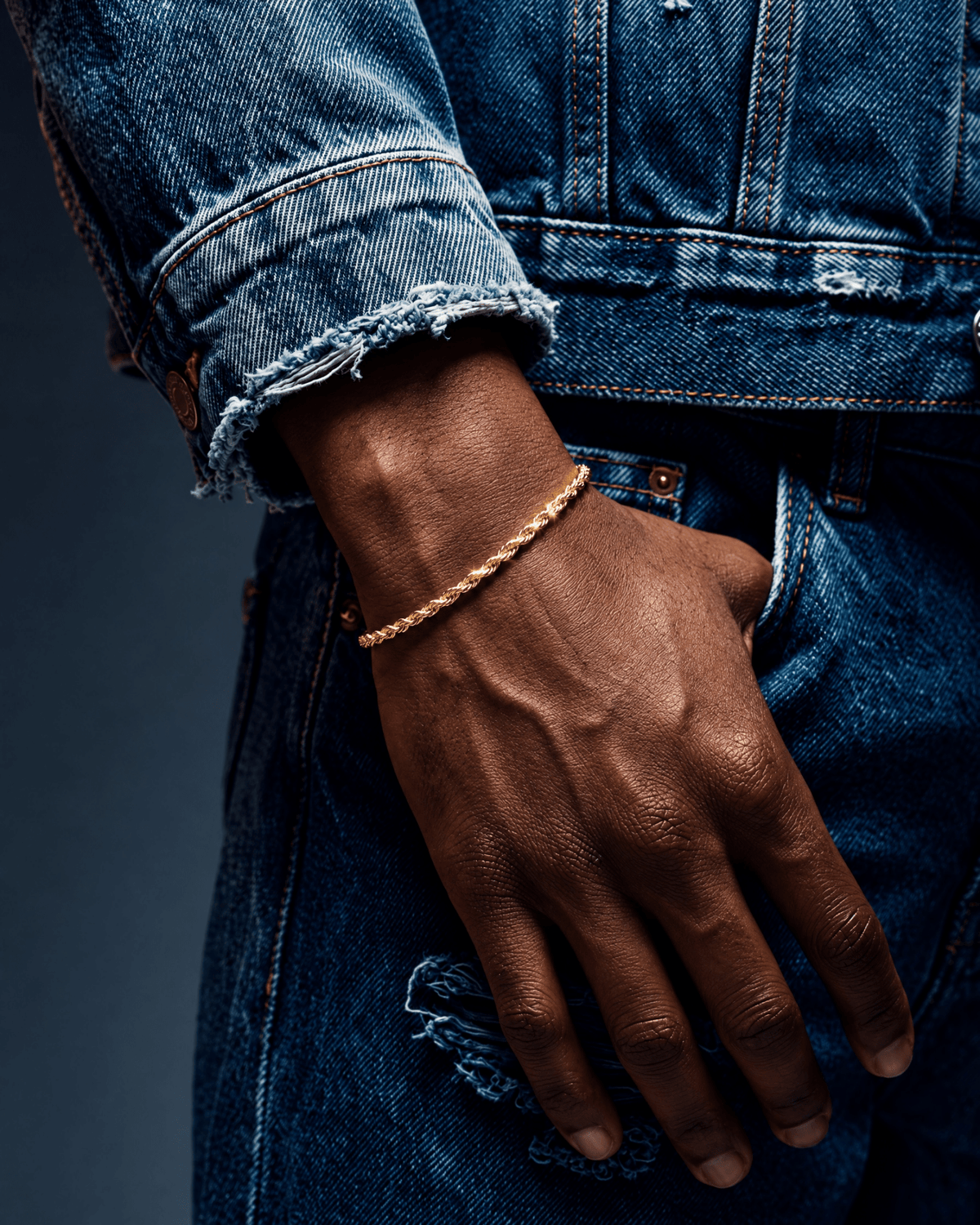 2mm gold Clean Rope bracelet worn on the wrist