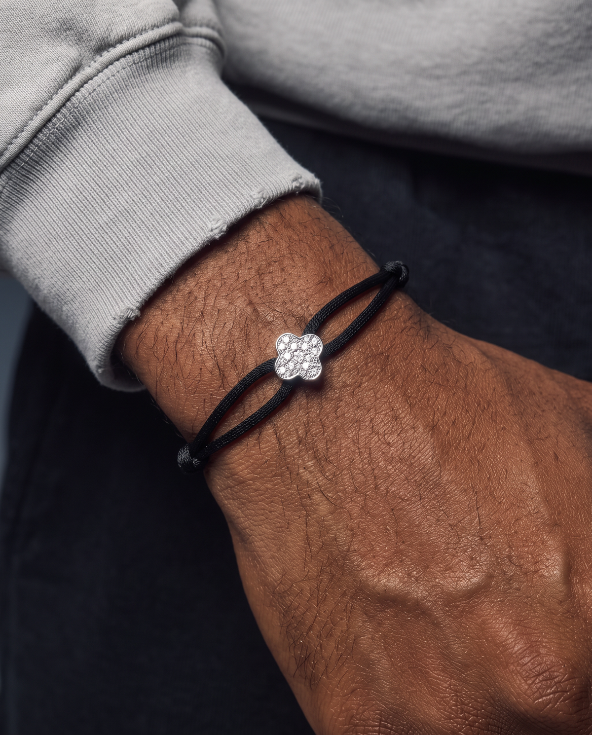 MOISSANITE ICED CLOVER CORD BRACELET.
